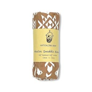 The Must-Have Muslin Baby Swaddle Blanket in Terracotta by Hatchling Baby